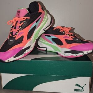 Puma Pink and Black Sneakers with Bold Design